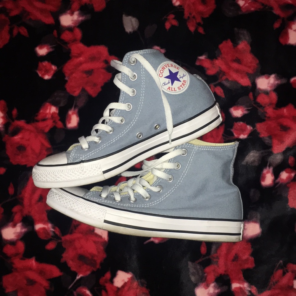 Slightly used light blue high top converse